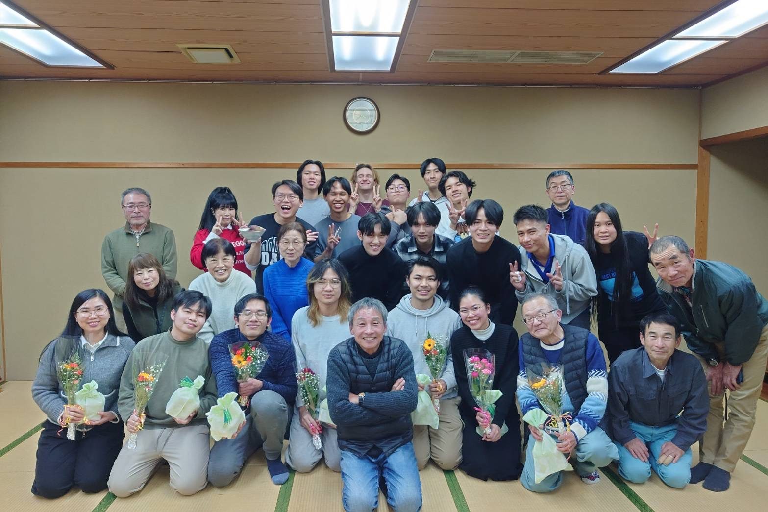 Farewell gathering with flower bouquets